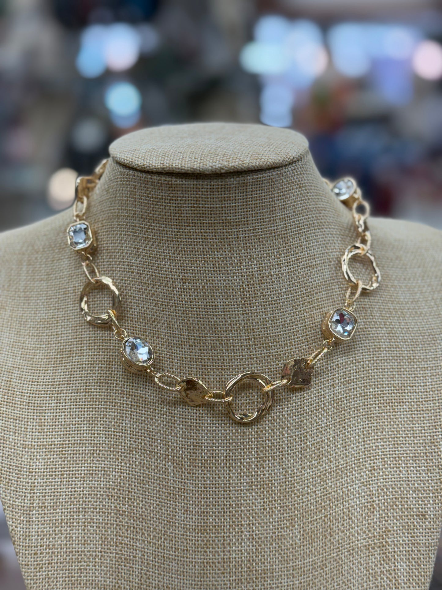 Gold Textured Necklace With Clear Gem Stones