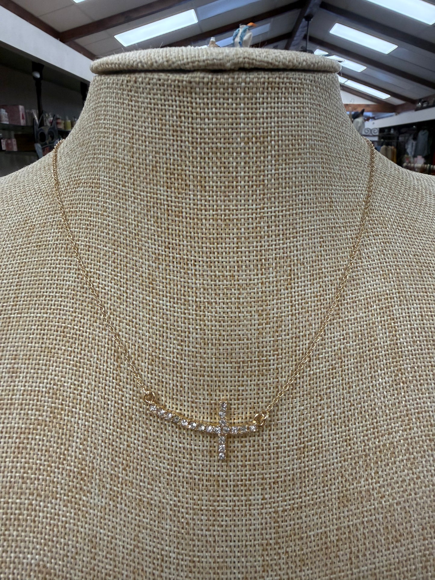 Gold Crystal Curved Cross Necklace