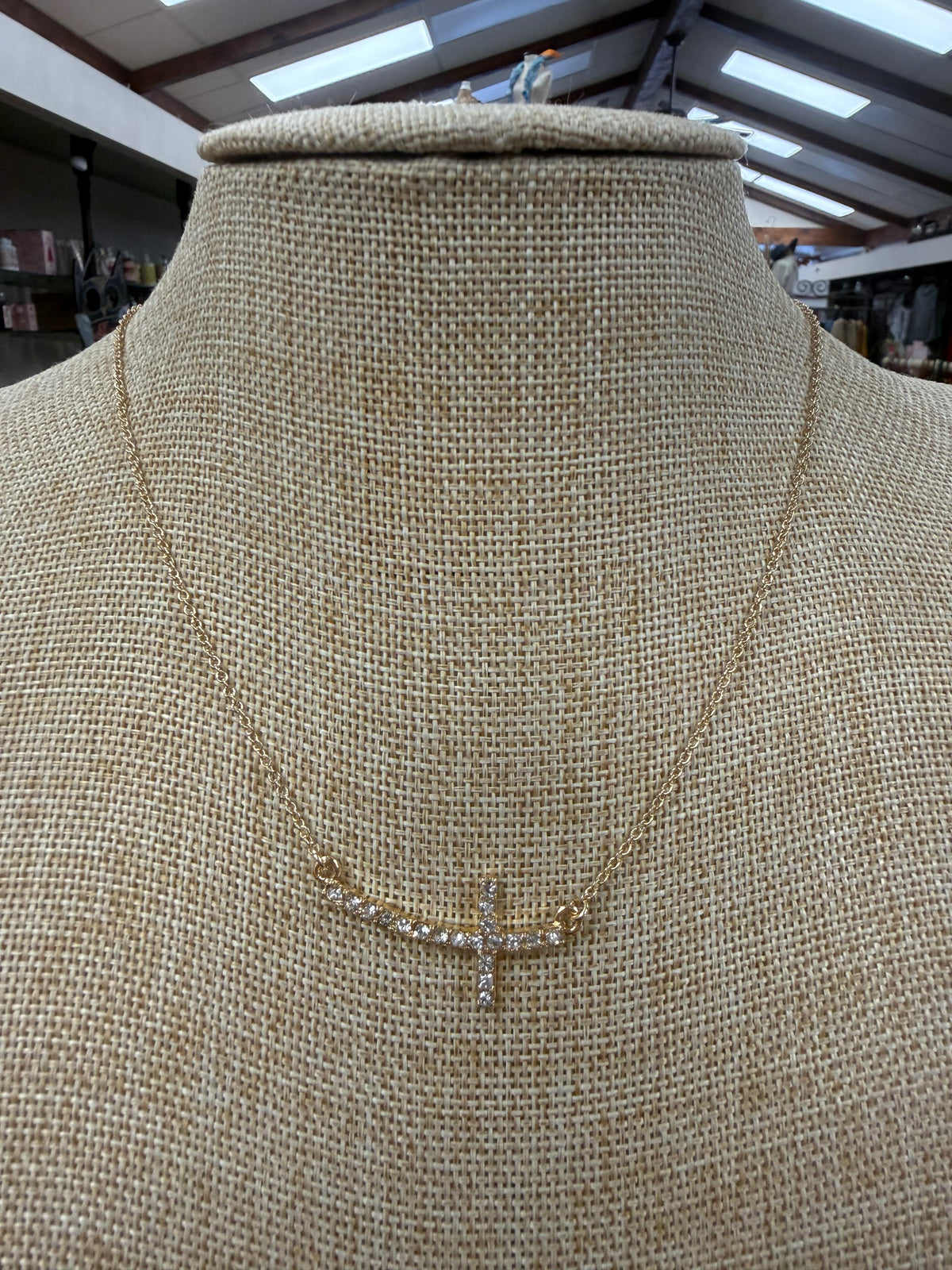 Gold Crystal Curved Cross Necklace